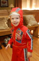 dsc_2882.jpg Trying out his "Cars" race suit for Halloween.