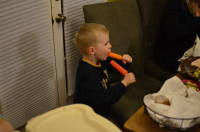 dsc_1758.jpg Two popsicles keeps Devin happy enough to let us eat.