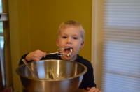dsc_2520.jpg Making frosting for the gingerbread house.